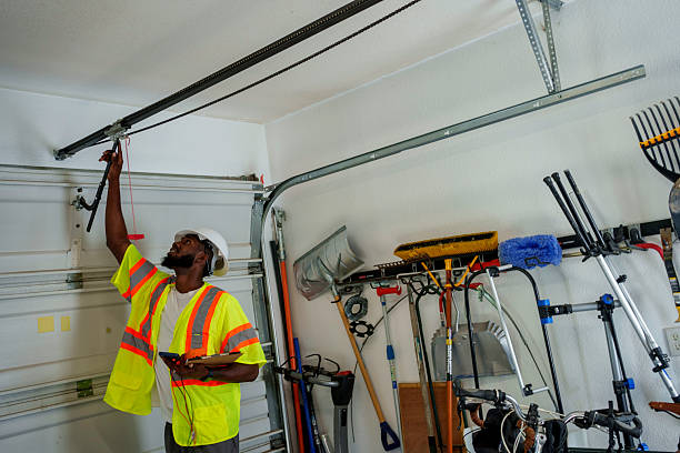 Professional Garage Door Panel Replacement technician working in Penn Estates, PA